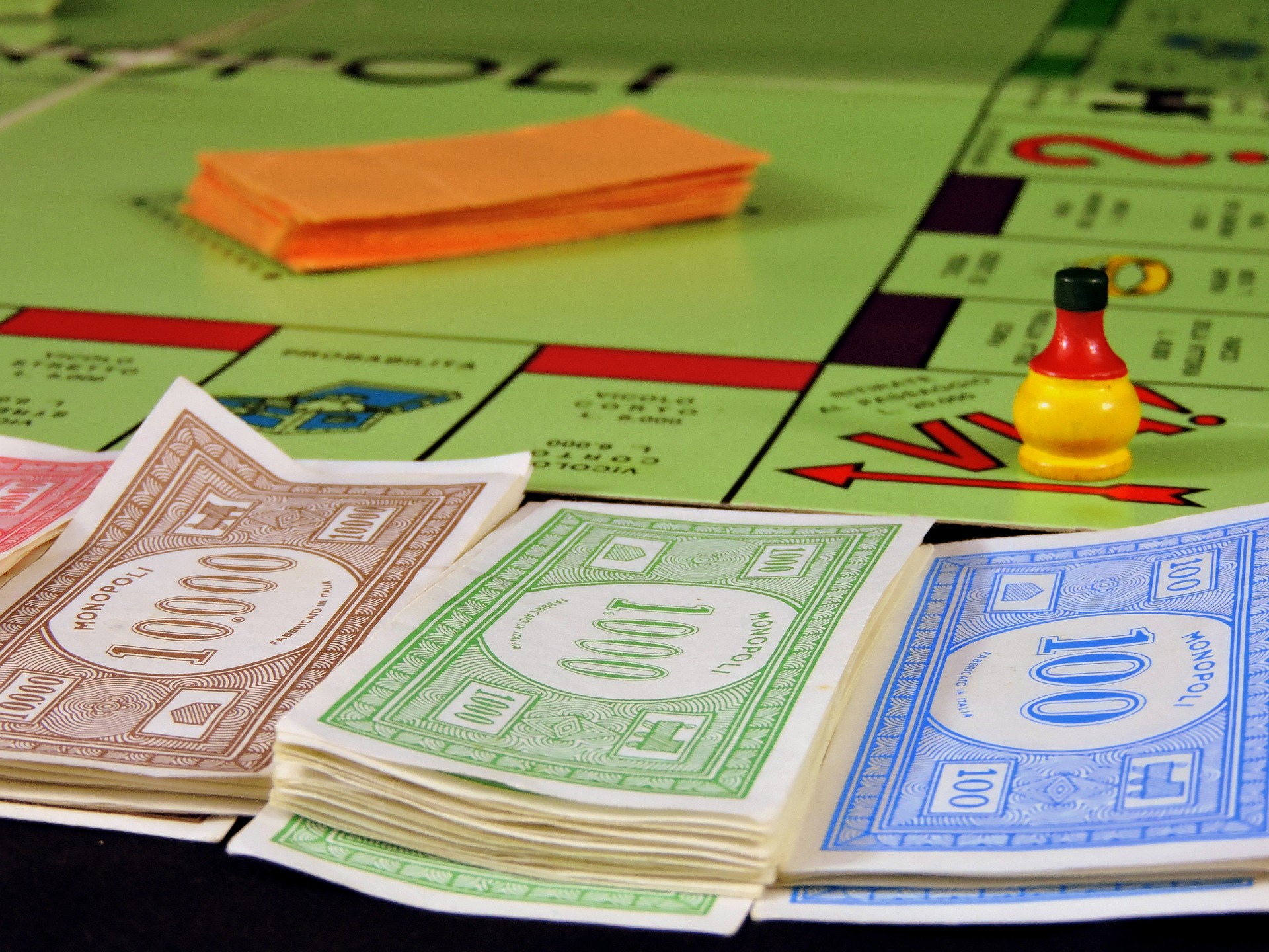 monopoly money demonstrating paper trading in thinkorswim